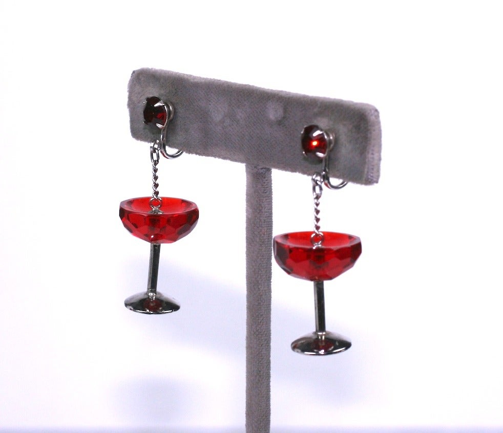 Mid Century Champagne Glass Earrings with faceted ruby crystal and pastes.
Charming figural motif earrings set in sterling silver with screw back fittings. 1950's Japan.  1.75