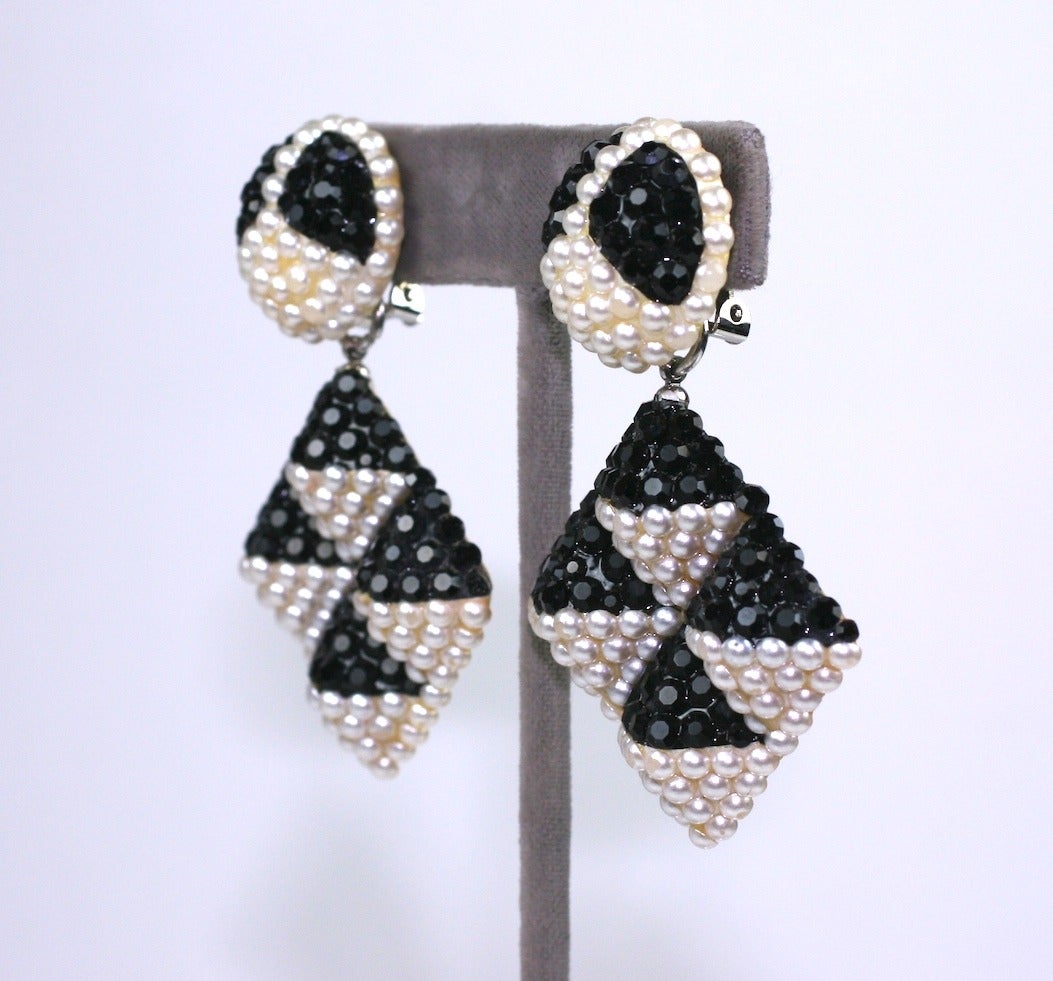 Striking Richard Kerr Pave Pyramidal Earrings in cabochon faux pearls and jet pastes. Flat back stones are set on round and pyramid bases for height and dimension. Clip back fittings. 1980's USA. 2.5