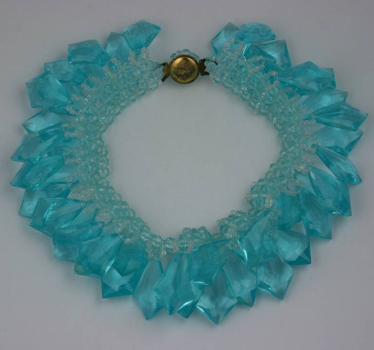 Coppola e Toppo aquamarine faceted crystal bead and large aqua lucite chandlier crystal collar. Large drops hang off a signature woven interior band of crystals around neck. Handmade and striking. Unsigned.
L 14