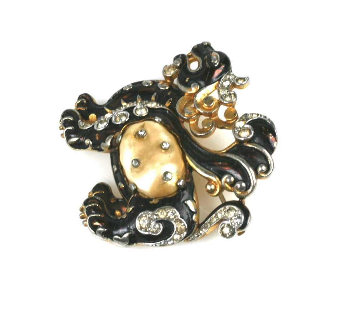 Early Trifari Ming Dragon by Alfred Phillipe. Black enamel over gold with pave studded 