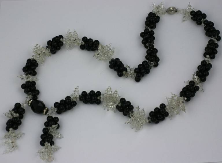 French art deco lariat of hand made pate de verre beads of jet pear shaped beads and crystal 