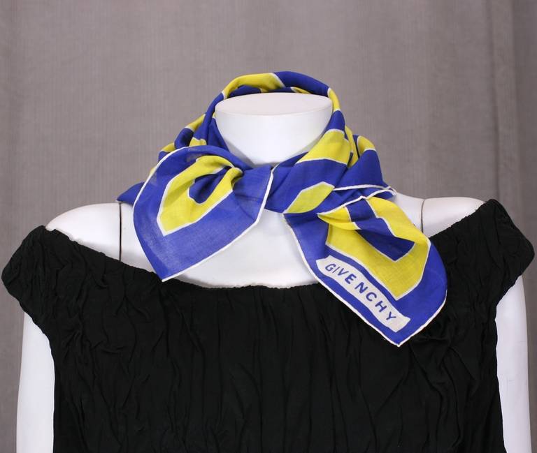 Graphic cotton scarf in chrome yellow and cobalt blue by Givenchy, Paris.
1970's France. 22' Square. Excellent condition.