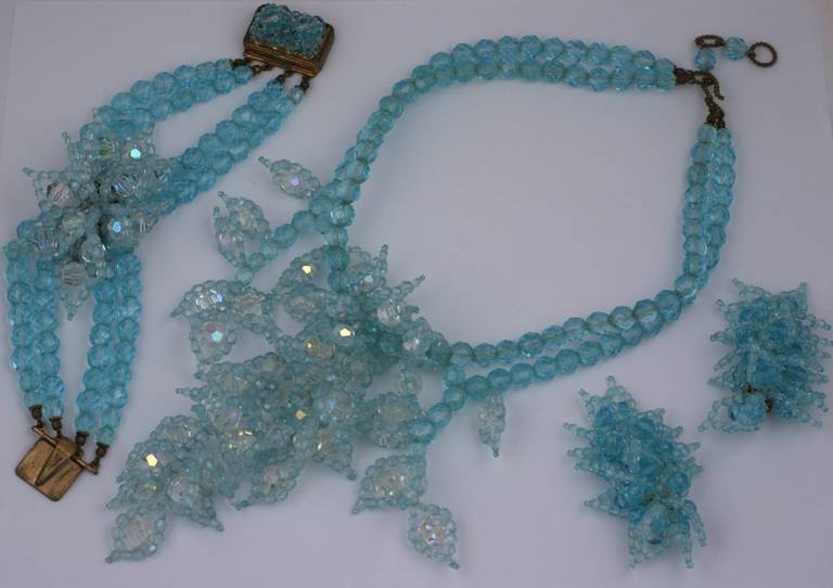 Important Coppola e Toppo suite of varied shades of aqua blue ombre cascading crystal leaves . Necklace, bracelet and earclips.
necklace  15.50