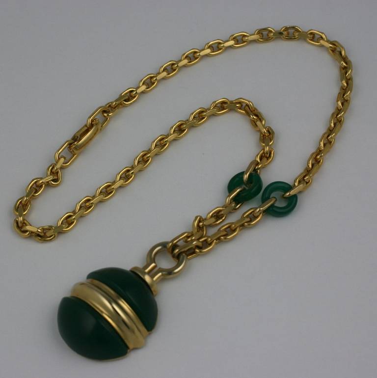 1970's Christian Dior Pendant in gilded metal and faux jade bakelite. Large domed pendant hangs from chunky gilt chaining signed by Grosse who manufactured for Dior in the 1960's and 70's. chain 20