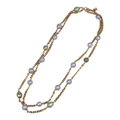 Sautoir Chanel avec perles lilas et céladon