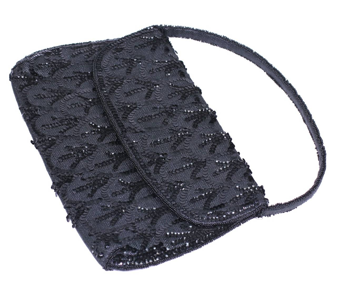 Chic Sequin French Bag on black linen base. Elegant and timeless detailing with even seed bead borders on the interiors and edges of strap. Moire taffeta lining. 1950's France.  Excellent condition.  11