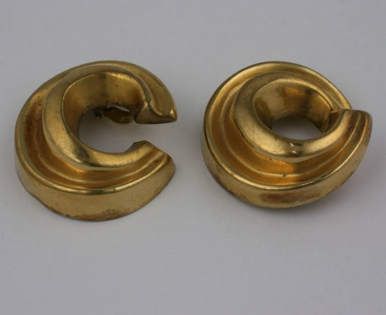 Gilded 3 dimensional, sculptural swirl earring by Steve Vaubel from the 1990's. Striking and bold with clip back fittings. Excellent condition. 1.75