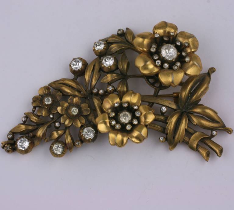 Large Trifari Retro clip from the 1940's in bronze-green gold finish in the antique style. Designed to look like an antique Victorian diamond spray with 2 spring mounted flower heads which tremble with wearer. Rare and collectible series by Trifari,
