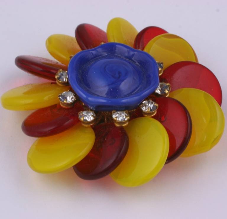 Miriam Haskell round brooch of chrome yellow, bright red, and lapis blue Venetian glass with crystals surrounding the central handmade glass cabocheon. 1950's USA. Excellent condition.  2.50