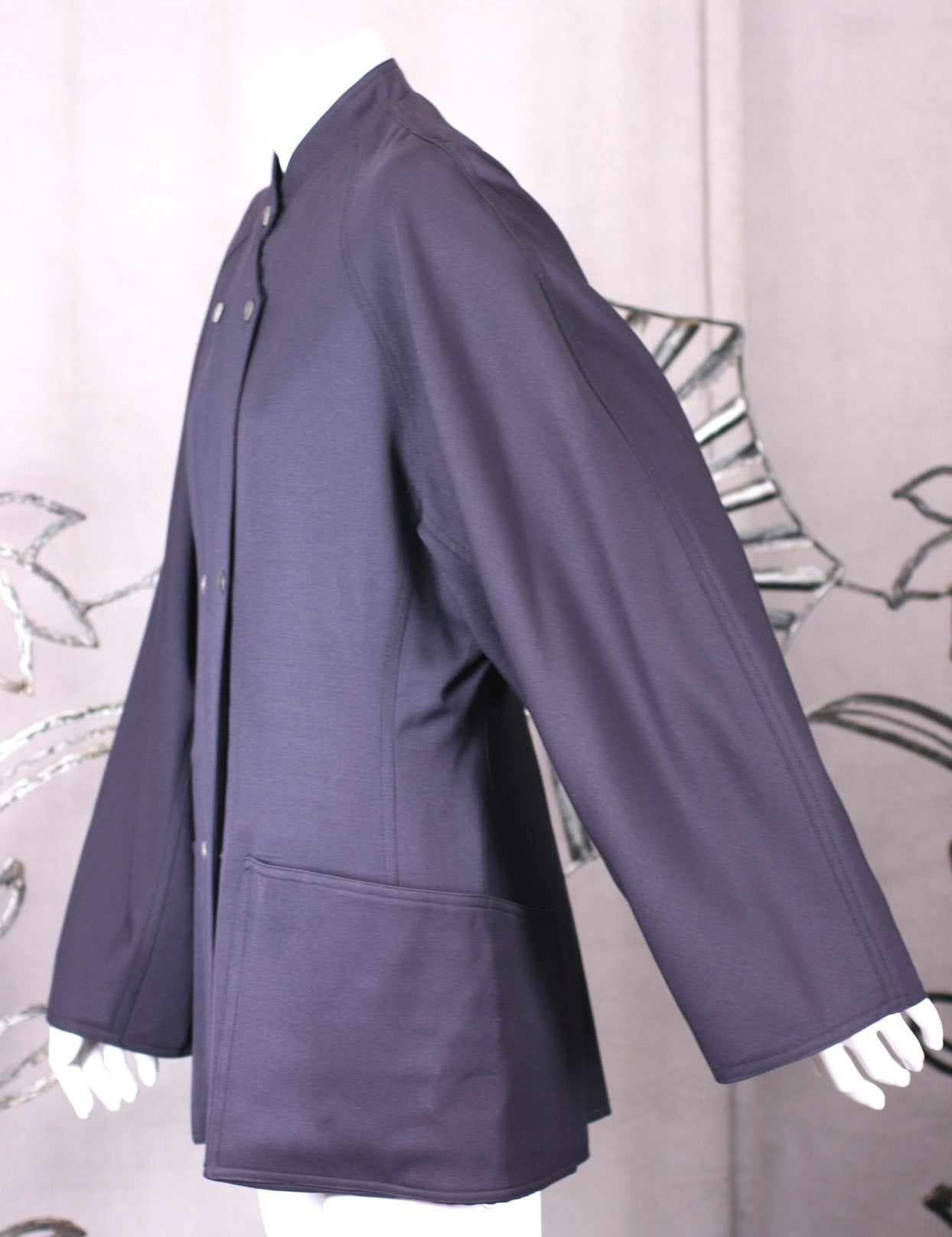 Anne Marie Beretta Wool Gabardine Double Breasted Jacket with signature snap closure detailing. Beautifully cut in navy wool gabardine with full raglan cut sleeves and large hip pockets. Fitted at waist with natural shoulder with slightly Asian