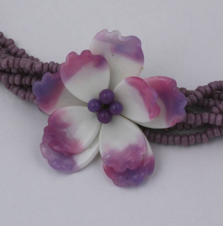 Miriam Haskell ombre mauve Old Rose flower necklace of handmade pate de verre  petals and multi strand strand seed beads  1950's USA. Excellent condition.
13.50
