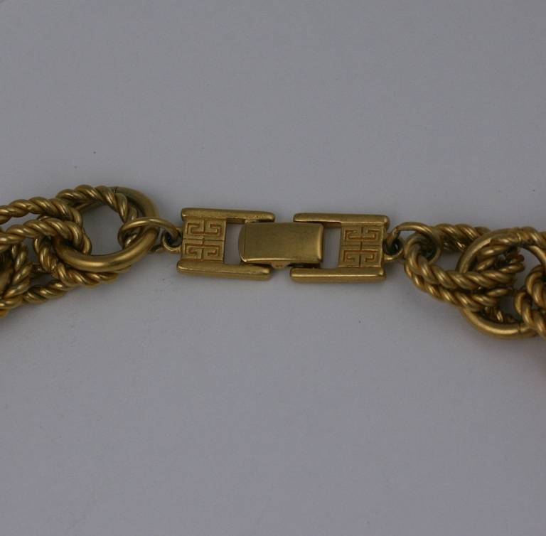 Attractive and chunky twist link gilt chain necklace by Givenchy, Paris. Embossed logo clasp. 18