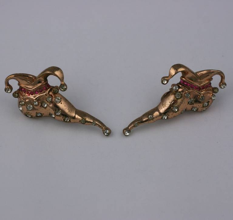 Charming Nettie Rosenstein ear clips of rose gold plated sterling with pink and clear crystals. Unusual figurals a la N.R. Unsigned, signed 