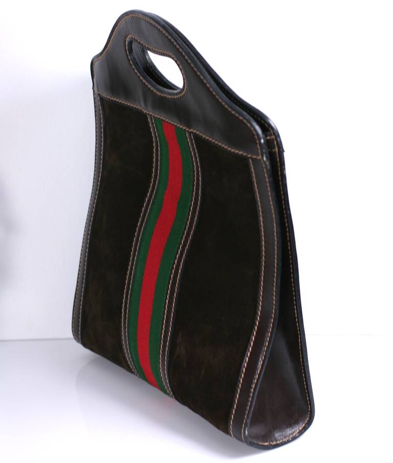Gucci suede and leather easy mini tote with signature green and red stripe twill trim. The body is deep chestnut suede with deep brown calf trim. Perfect tablet size. Lined. 1980's Italy. 14
