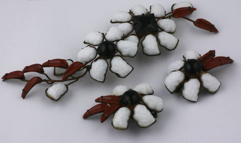 Schrenier parure of a large brooch and earclips. Set in antique copper with white, black and cinammon brown pate de verre leaves and petals in hand set pronged settings. Brooch 5.5