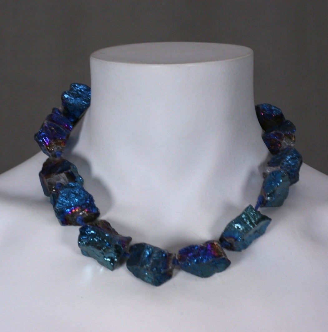 Mark Walsh Leslie Chin raw quartz nugget bead necklace with iridiated blue finish. Strung loosely knotted on cord with antique japanned lobster clasp.
17.5