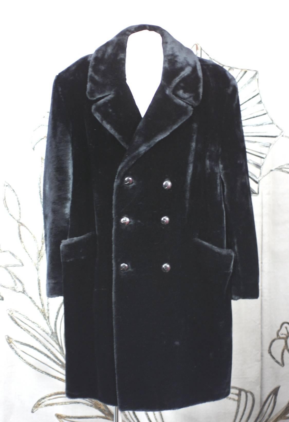 Men's Plush Faux Alaskan Seal Car Coat.
The ladies had Blackgama in the period, the men had Borg-gama or Borg Alaskan...a luxurious faux plush fur that was created to resemble a high pile Alaskan seal pelt. 
In reality, it has more of a teddy bear