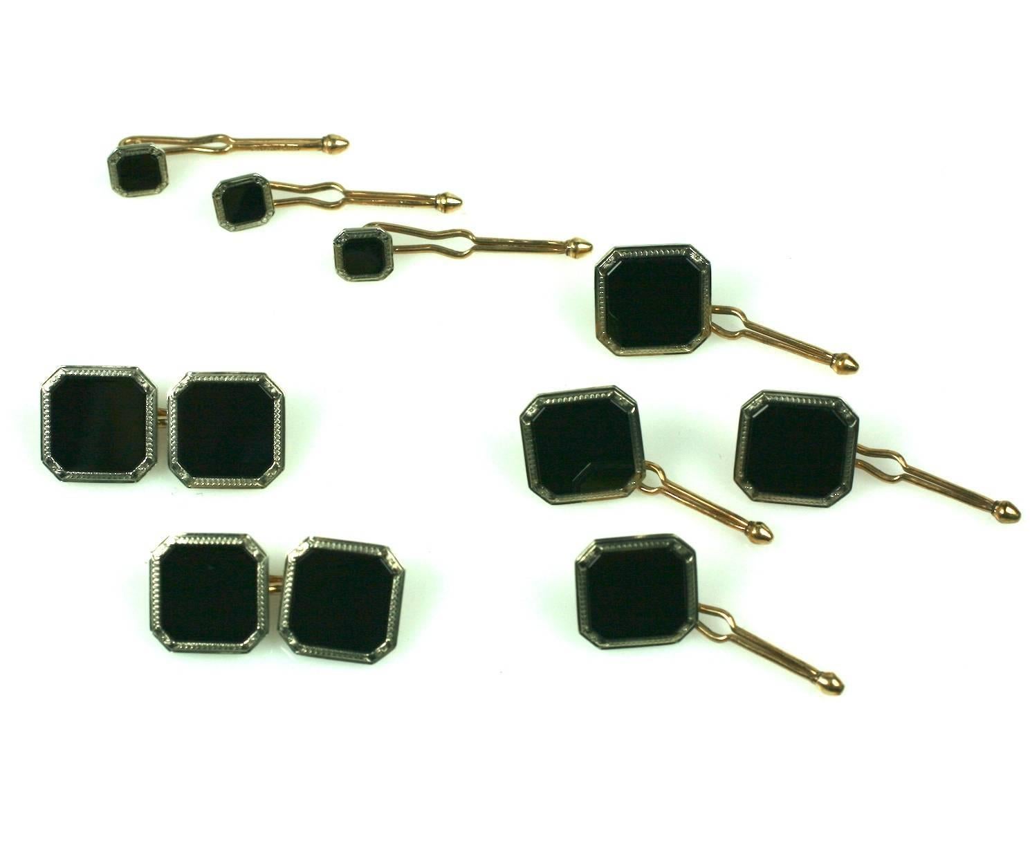 Krementz Onyx Tuxedo Stud Set in original Box from the 1920's. Full set with  cuff links, 4 vest buttons and 3 shirt studs. Silver toned etched Deco borders with gilt metal backs. 1920's USA. Excellent condition. 

