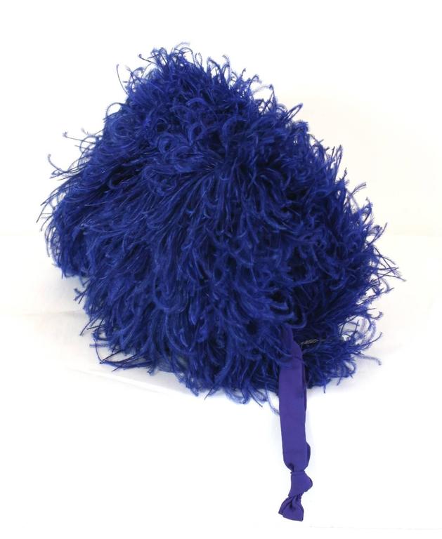 Vibrant Sapphire Curled Ostrich Feather Muff from France, 1930's with wrist strap. Art Deco period. Excellent condition. 