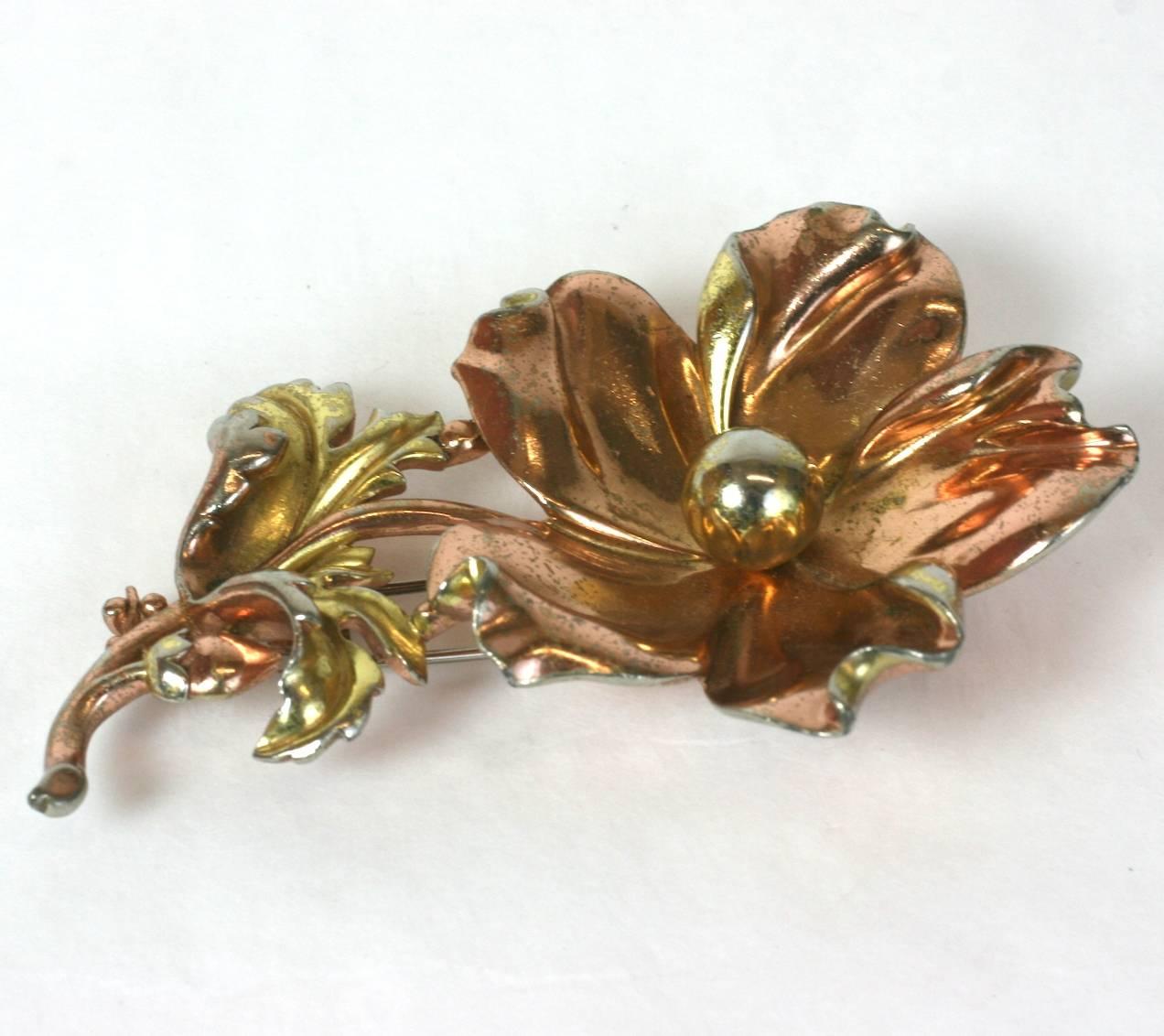 Trifari retro style poppy clip brooch of pink  and yellow gold plated 2 toned metal with fur clip fitting. Excellent Condition. Length 3.75