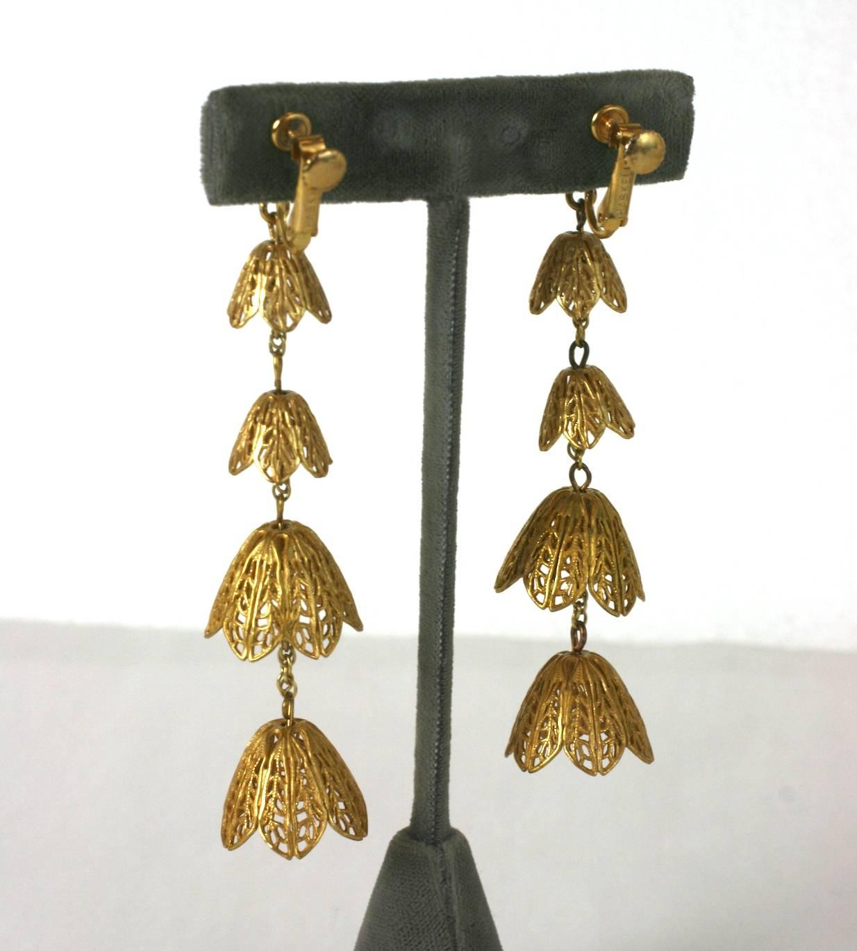 Miriam Haskell filigree long bell flower ear clips, of vari sized floral and round filigrees in signature Russian Gilt, with clip fittings. Excellent condition. 
L 3.75