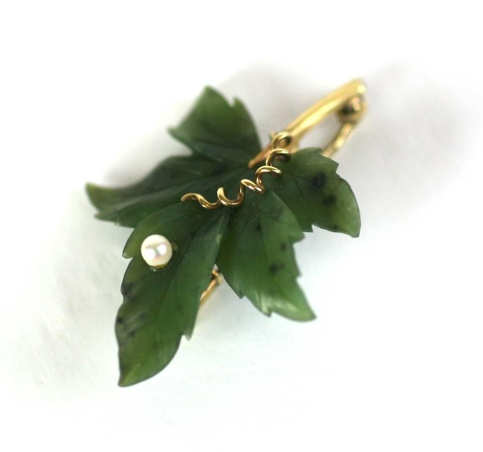 Charming carved nephrite Jade leaf brooch with gold wire tendrils and cultured pearl. 1950's European. Excellent condition. Set in 14k gold, 
