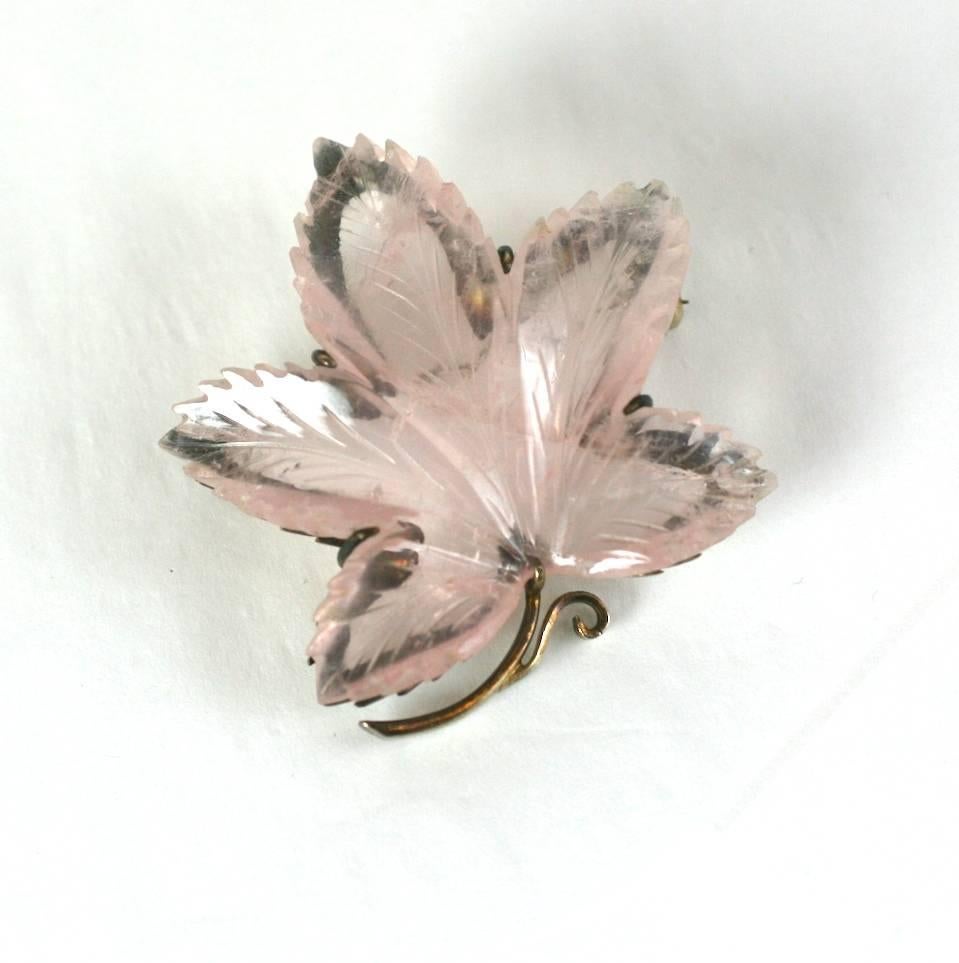 Charming Rose Quartz Leaf Brooch from the 1940's. Beautiful lapidary work in the detailed leaf, cut from one piece of rose quartz. The hand made setting is gilded silver. 
Natural inclusions in the stone add additional dimension. 
1.5
