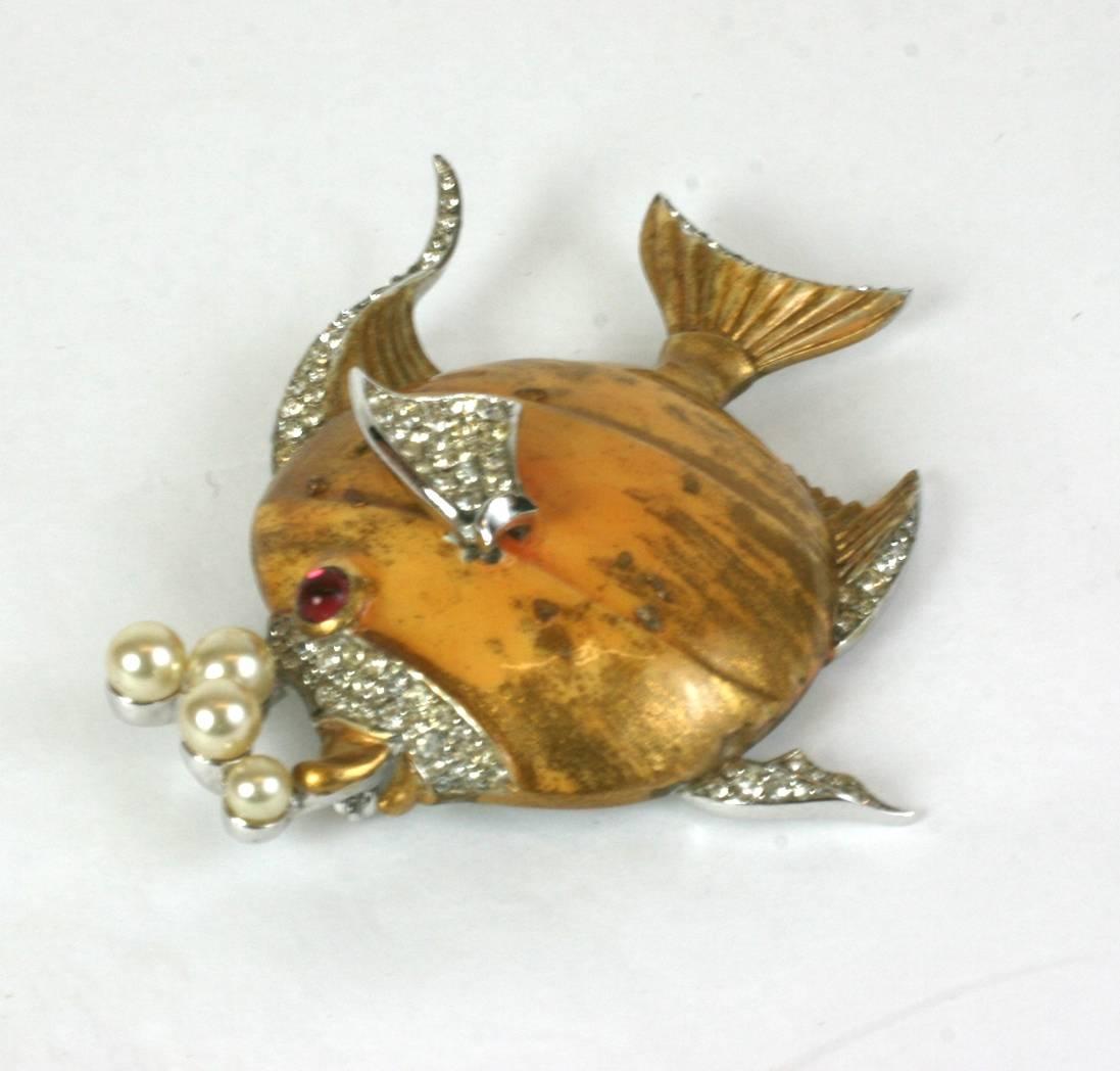 Charming and collectable Trifari Angelfish brooch with pearl bubbles and pave rhinestone accents. Unusual finish which is hand painted with gold highlights with the addition of particles on the glaze for texture. Glass pearl bubbles. Rhodium back