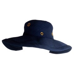 Cappello Hermes in lino Fibranne con occhielli e borchie