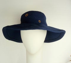 Cappello Hermes in lino Fibranne con occhielli e borchie