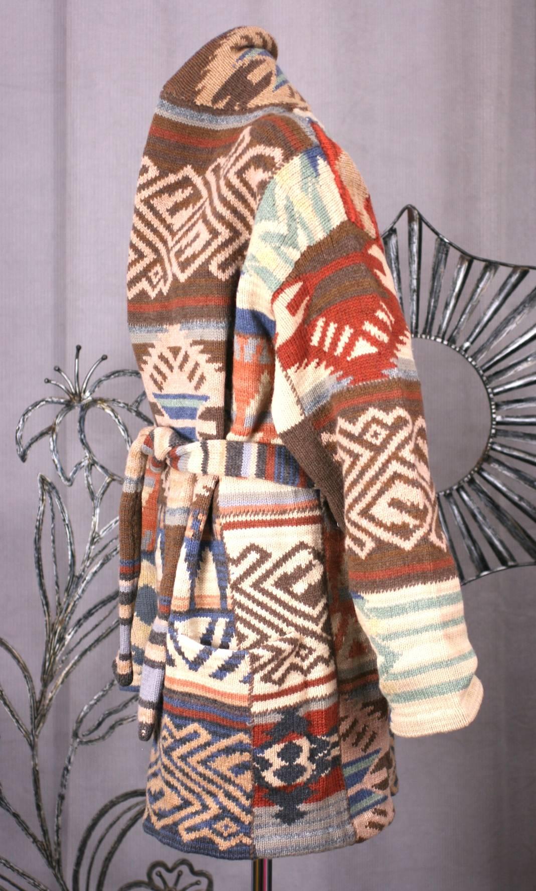Oversized Hand knit wrap cardigan with self tie belt in lambswool with alpaca from Lauren. Navajo patterned motifs throughout. Warm and versatile outer wear piece. 
Length 33