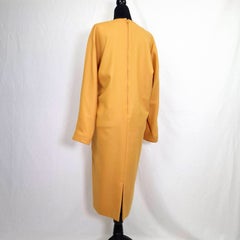 Vintage mustard-yellow Pierre Cardin "space age" dress from the 1970s