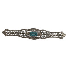 1930s Art Deco White Metal Bar Brooch with Aqua Blue Glass