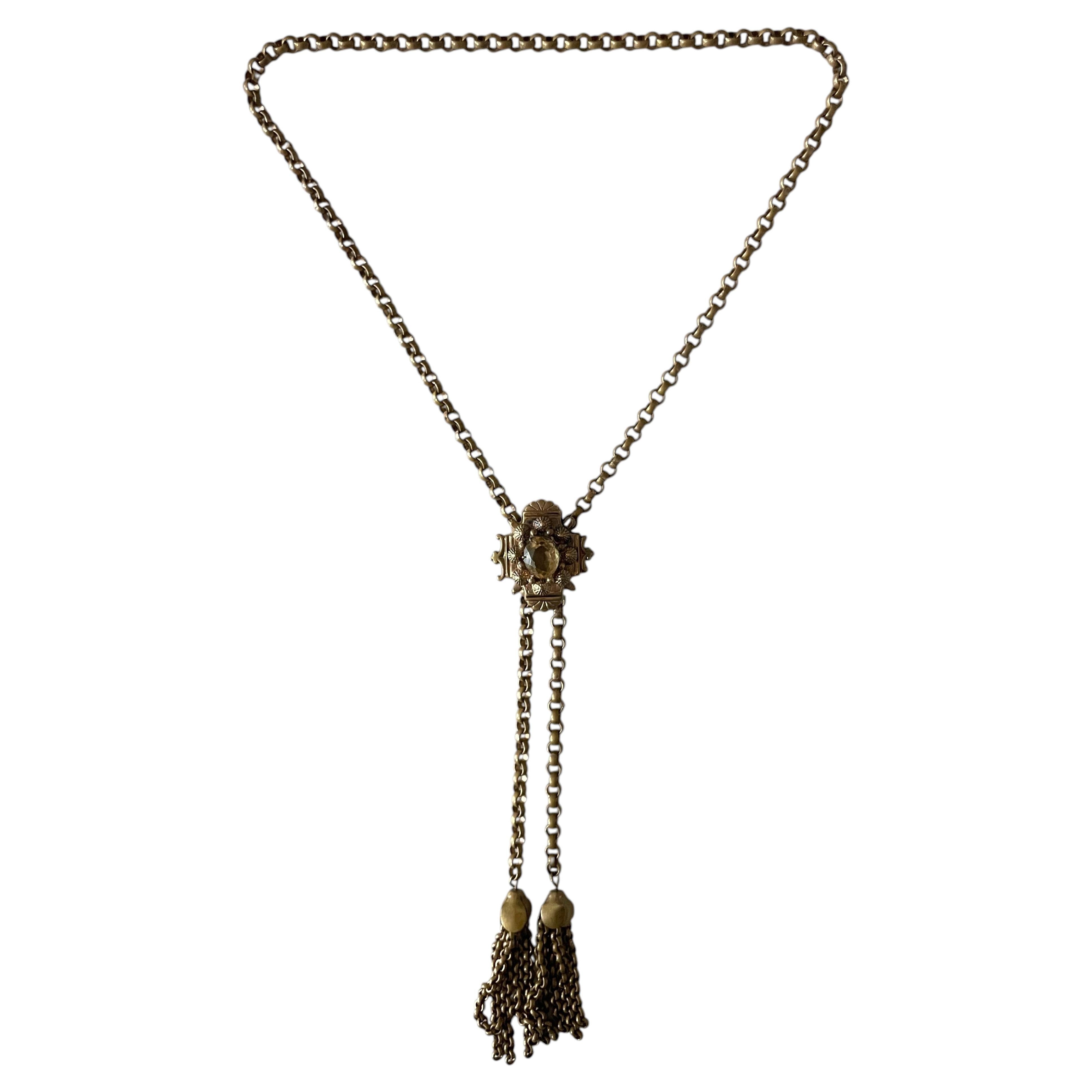 Collier lariat victorien avec pendentif en verre citrine et pompon, vers les années 1880 en vente