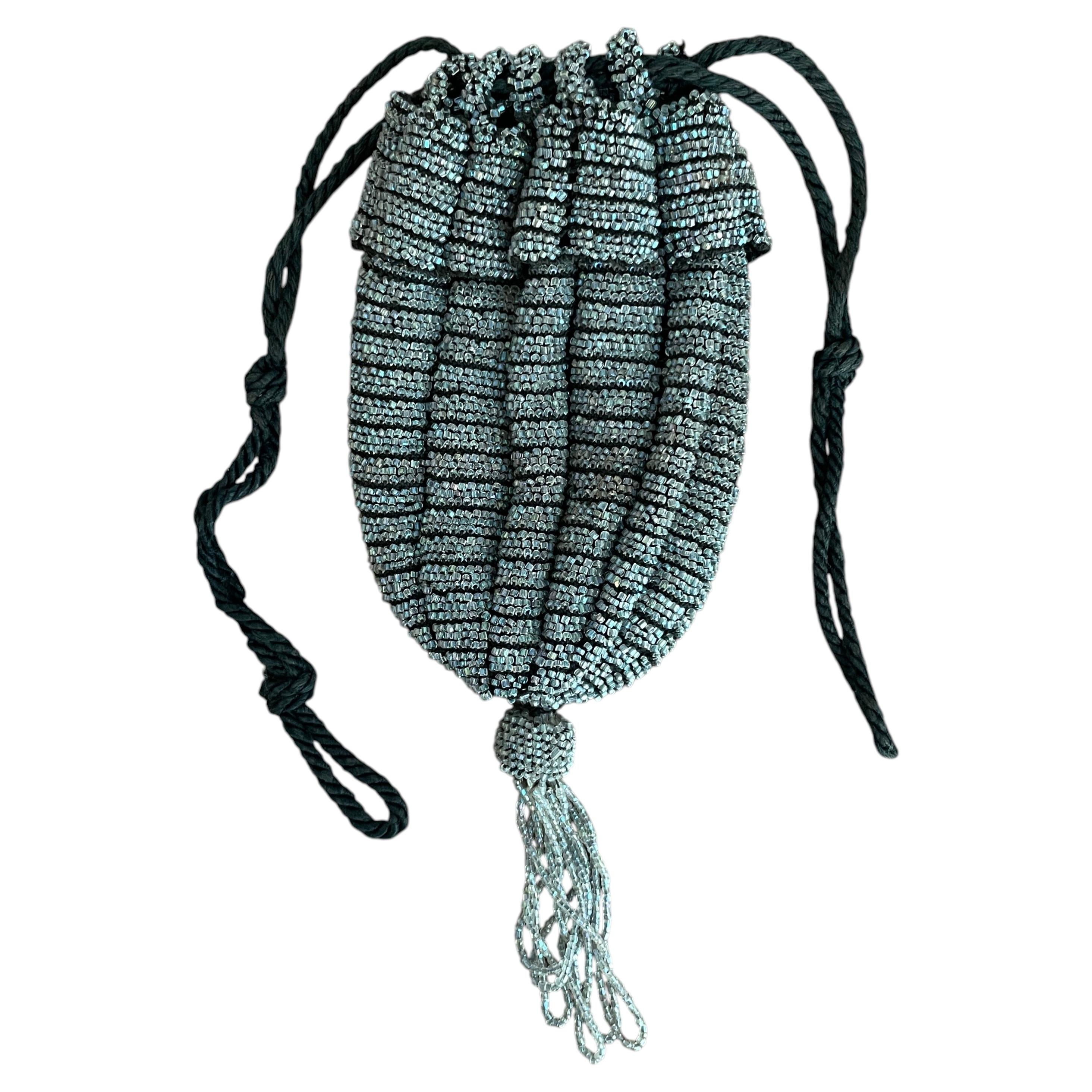 Who invented the first purse?