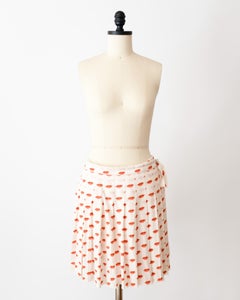 Falda midi plisada con estampado de labios de Prada, colección primavera-verano 2000, ASO «Sexo en Nueva York» (talla S/M)