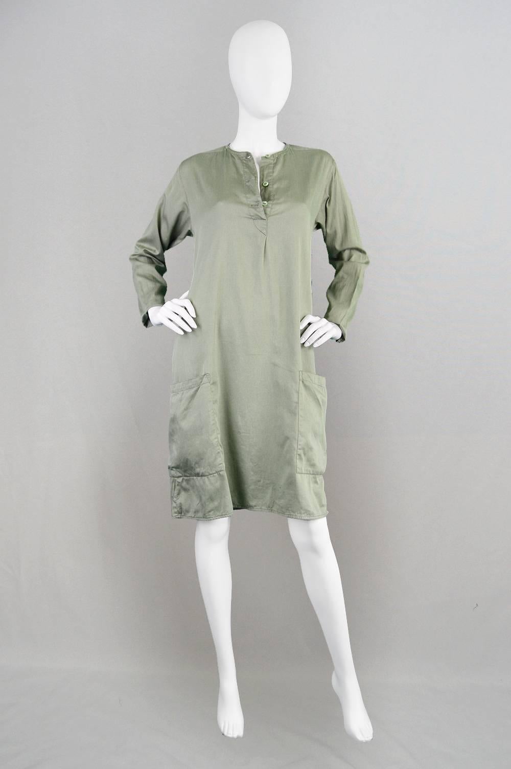 A stunning vintage Kenzo Jap dress from the 1970s, a great example of his earlier work. The beauty of this minimalist cotton shift/ tunic dress is in its simplicity - which makes it incredible for layering or worn as a minimalist look. Inspired by
