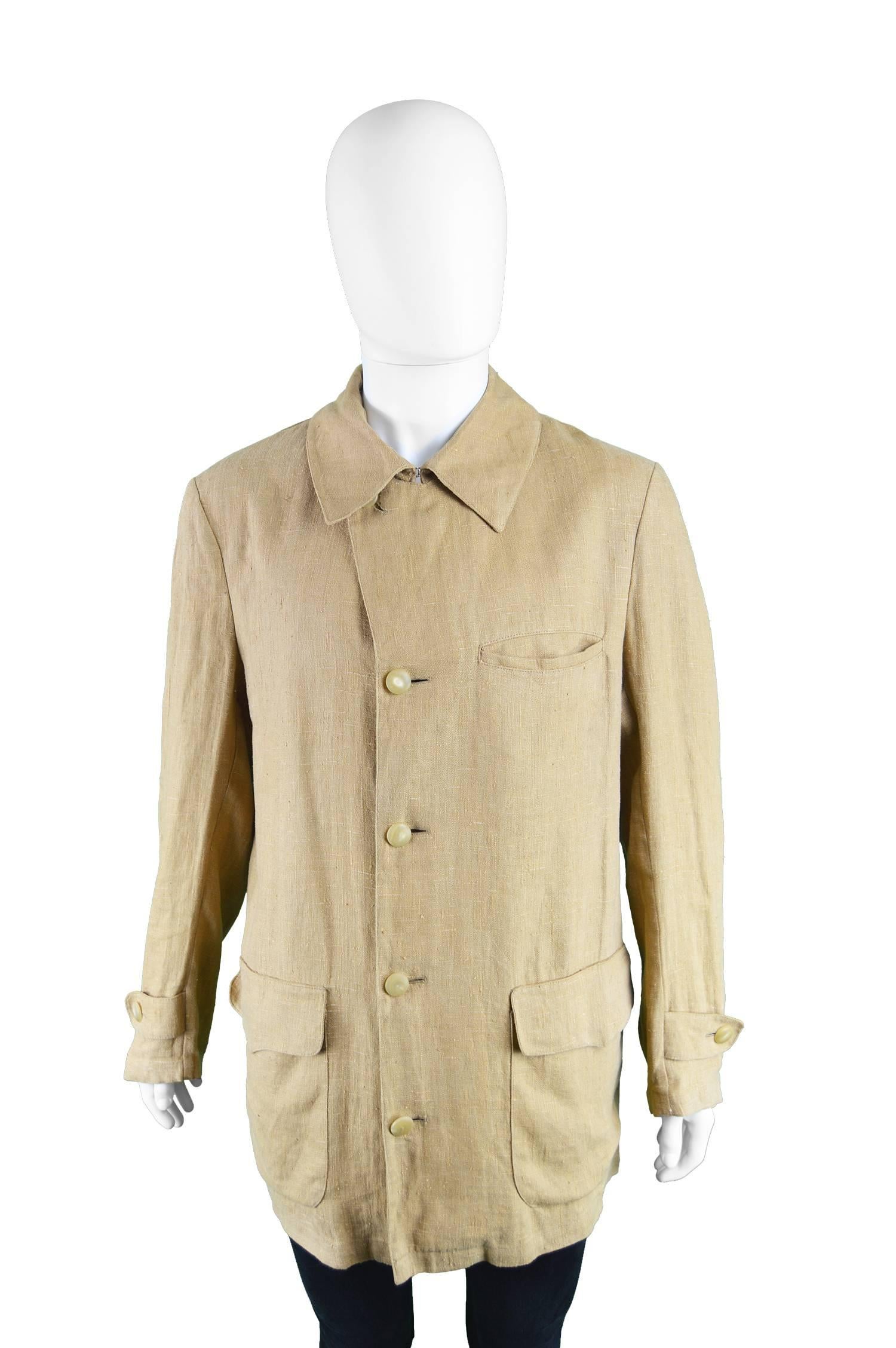An excellent vintage men's jacket from the 90s by Italian luxury designer Nino Cerruti for Cerruti 1881. Beautifully constructed in Italy, the fabric is a khaki linen that drapes well and looks to have been inspired by chore jackets but in a more