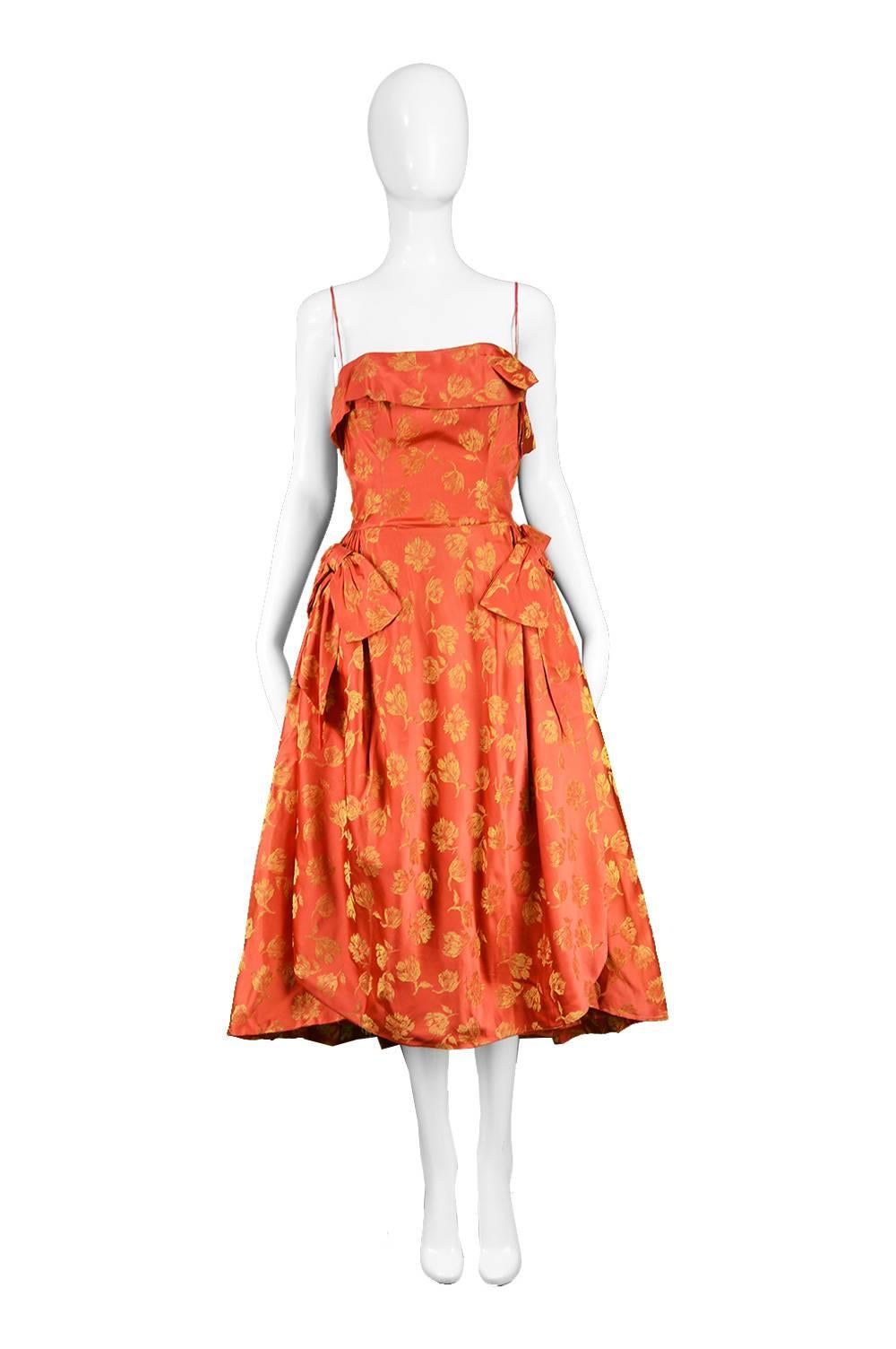 John Selby 1950s Vintage Red & Gold Brocade Jacquard Panelled Dress

Size: Marked 38
Bust - 34” / 86cm
Waist - 27” / 68cm 
Hips (Due to underskirt)  - up to 40” / 101cm 
Length (Bust to Hem) - 40” / 101cm

Condition: Excellent Vintage Condition -