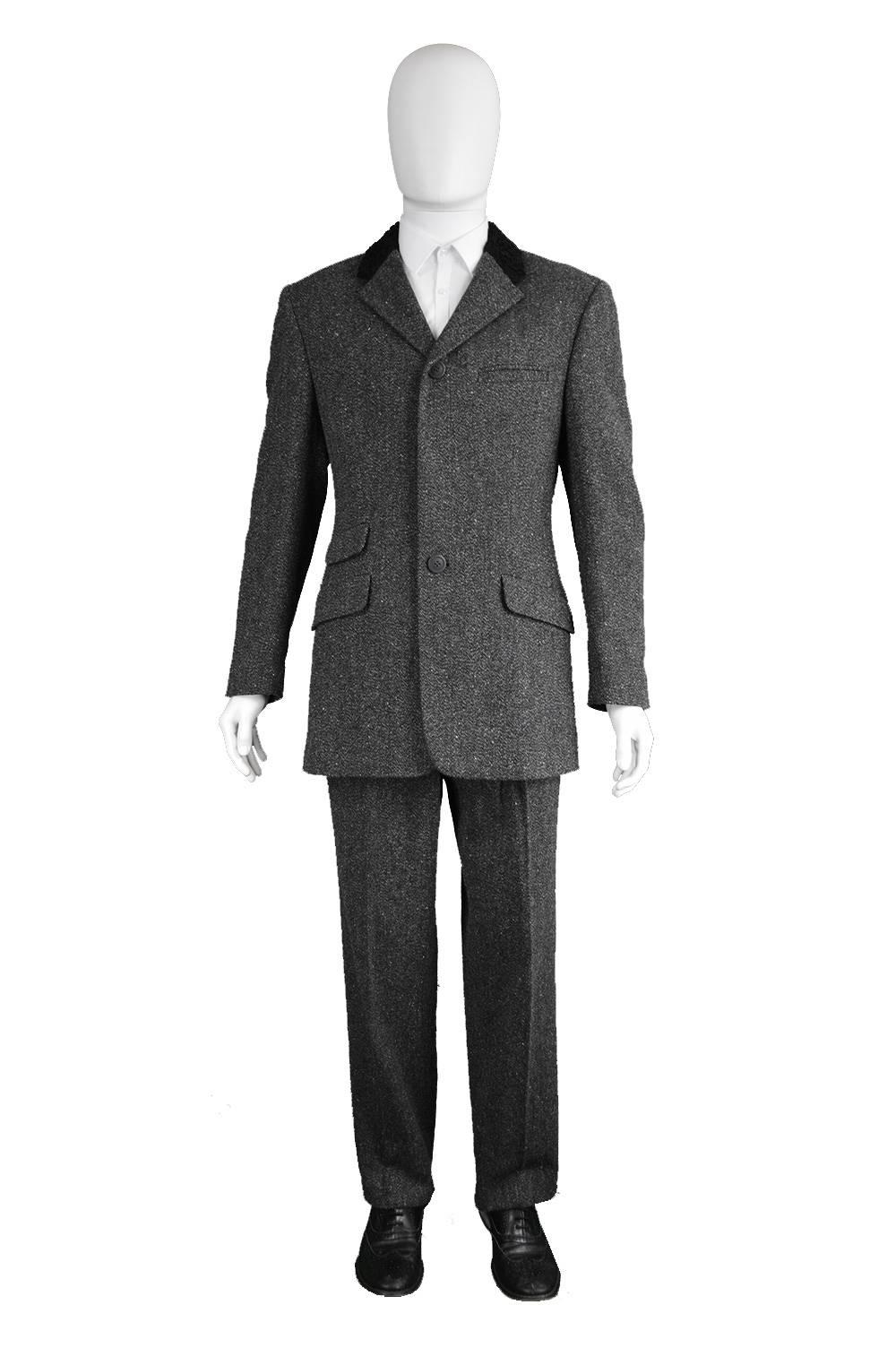 A rare men's vintage suit from the 1990s by legendary Italian designer, Gianni Versace. This masterpiece of a suit is so well constructed, Made in Italy, it features a textured wool collar, a slim, tailored waist, two statement Versace border