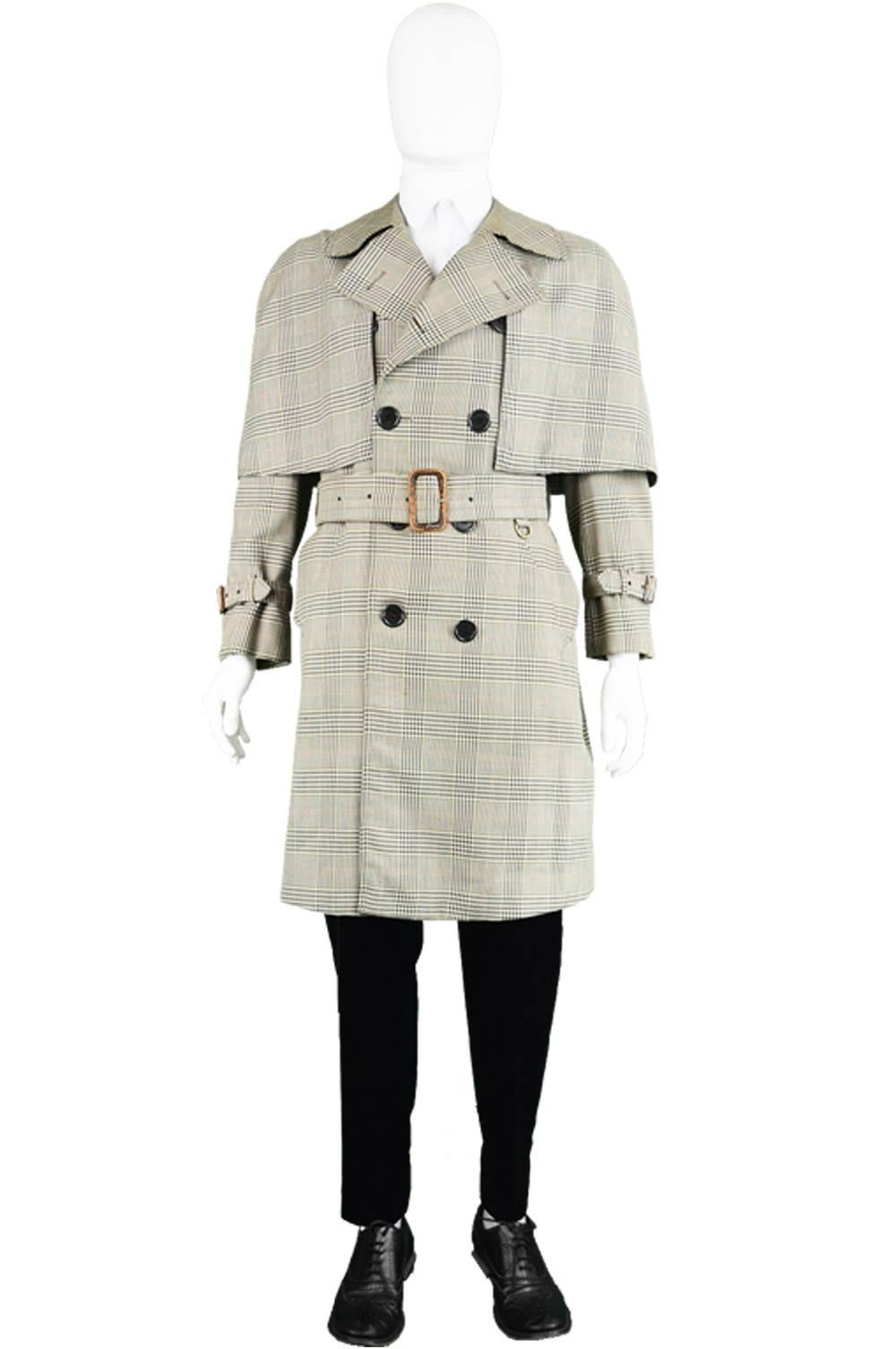 An incredible men's vintage coat from the 1960s by 'The Rayntre' for classic British luxury department store, Harrods. This rare inverness cape coat has a detachable cape for a versatile look. With double breasted buttons, a prince of wales check