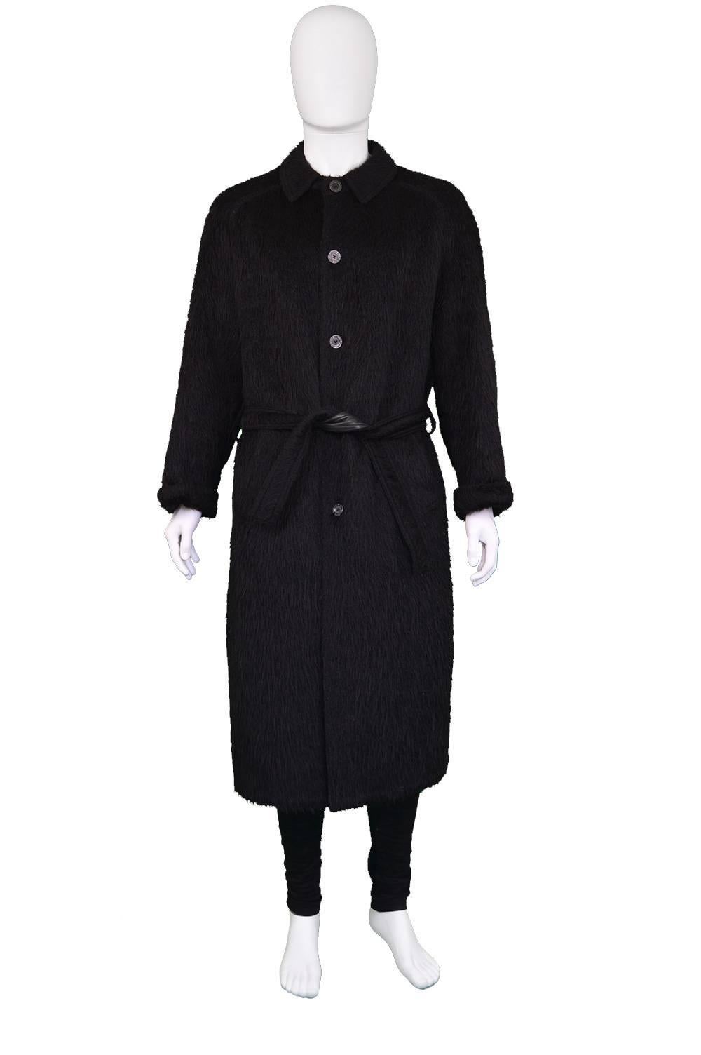 An absolutely breathtaking and incredibly rare vintage men's coat from the 1970s by luxury French fashion house, Hermés. In a luxurious black, fuzzy alpaca-wool blend with the softest lambskin leather on the back of the collar, on the inside seams
