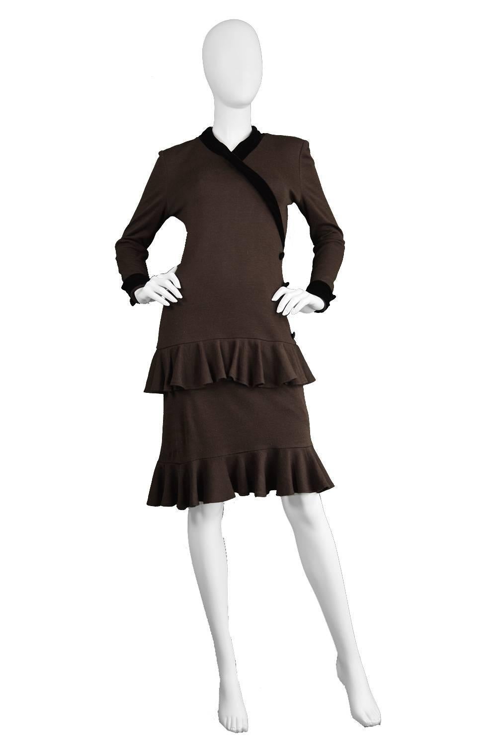 A playful yet sophisticated vintage dress from the late 70s/ early 80s by iconic designer, Oscar de la Renta for his 'Miss O' line. In a brown knit fabric with a black velvet trim highlighting the neckline and cuffs. The silhouette is fitted at the