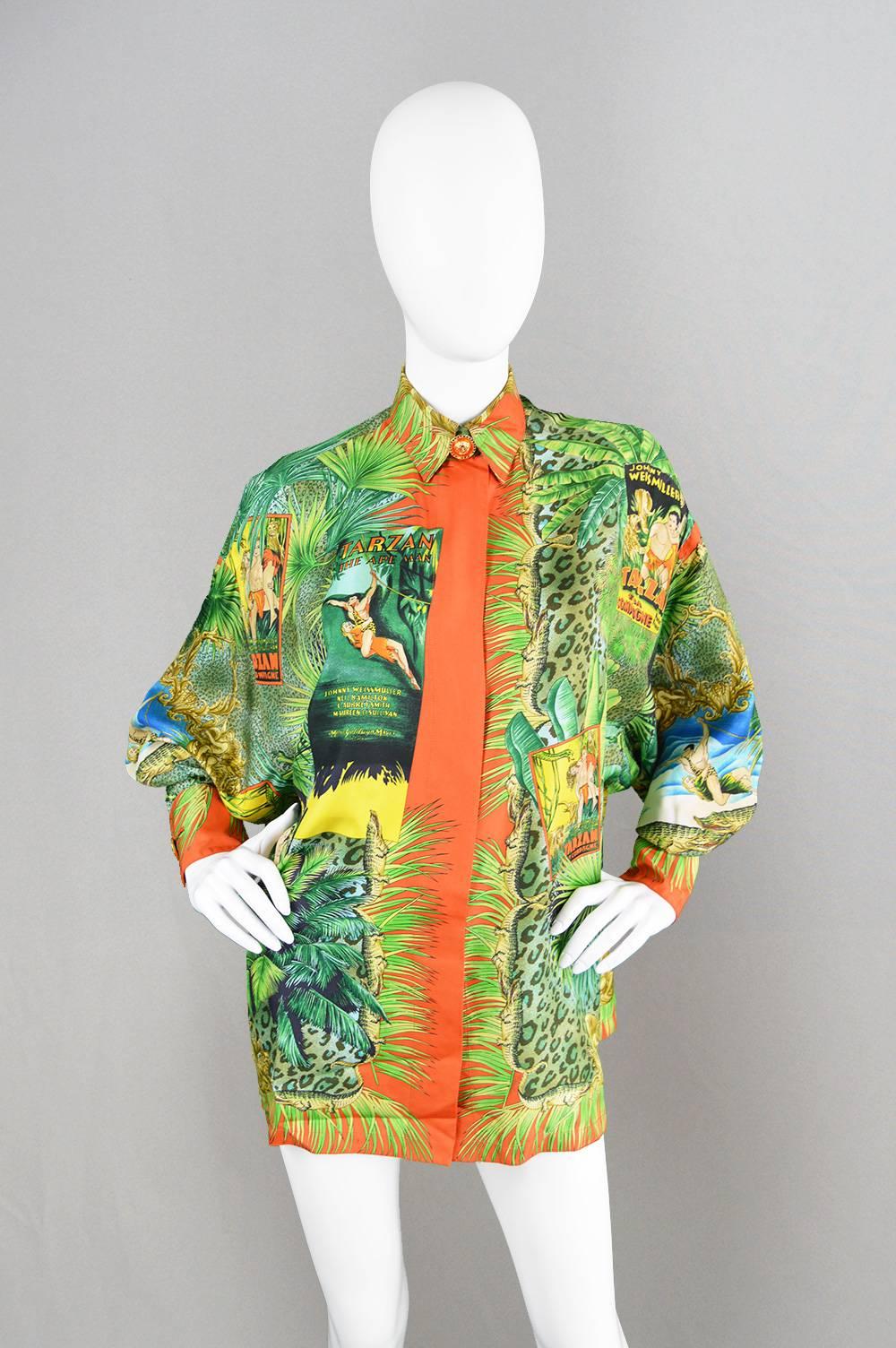 A rare and striking vintage silk shirt by legendary, luxury Italian designer, Gianni Versace for his couture line, from the Spring/ Summer 1993 collection. This incredible shirt features the Tarzan print - one of the most sought after and iconic