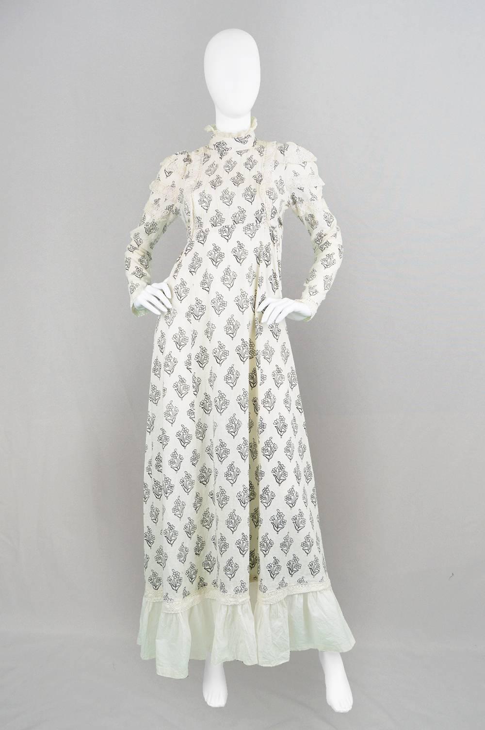 An incredible and highly collectible vintage bohemian dress by Carnaby Street label, London Mob - a huge player in the British boutique scene of the late 60s and early 70s. With its high neck, highlighted by a crochet trim, long, slender sleeves