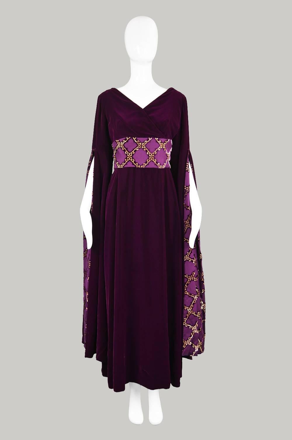 A breathtaking vintage evening dress c.1970, with incredibly long, dramatic sleeves that are lined in a luxurious brocade that create a renaissance/ medieval fairytale inspired look and matches the wide obi belt that hooks around the back creating a