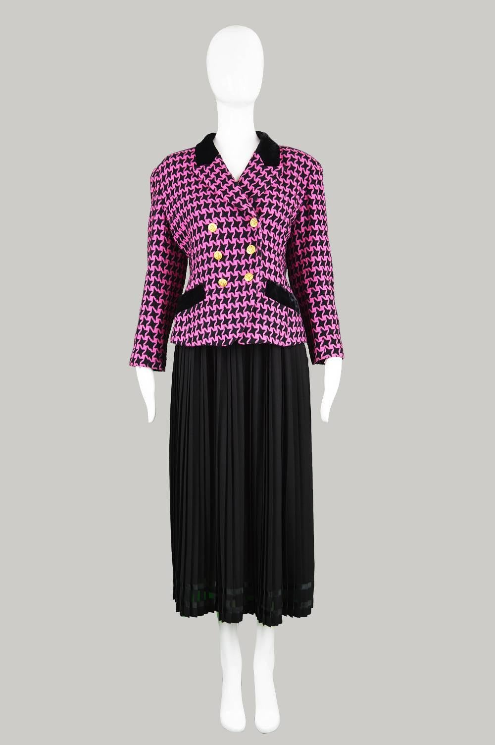 A classic and beautifully tailored vintage women's blazer/ jacket by luxury vintage designer, Charles Jourdan. With a bold pink and black patterning on a wool fabric with a velvet collar and trim to the pockets, and sophisticated gold-tone buttons.