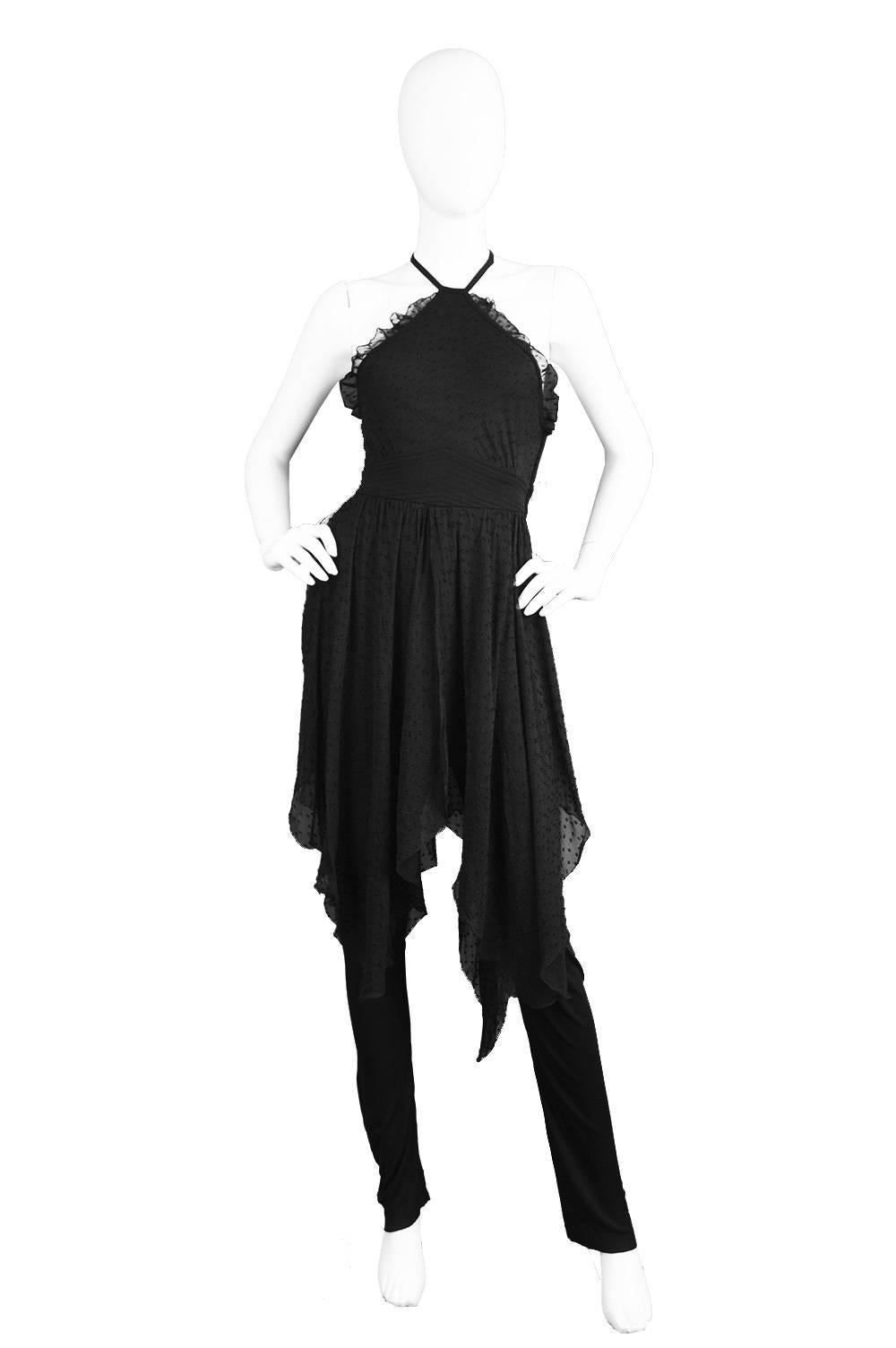 An elegant and unusual vintage jumpsuit by Hidy Misawa of London, in a slinky black jersey. 

Estimated Size: UK 8/ US 4/ EU 36
Bust - 32” / 81cm
Waist - 26” / 66cm
Hips - Free
Length (Bust to Hem) - 47” / 119cm
Inside Leg - 31” /