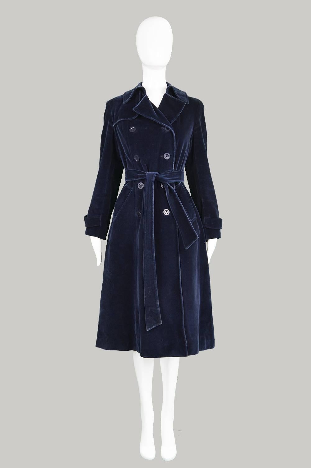 A timeless vintage women's peacoat from the 1970's in a deep blue velvet by Aquascutum of London.

Estimated Size: Small to Medium
Bust - 38” / 96cm (Remember to leave a few inches room for movement and clothes underneath)
Waist - up to 34” /