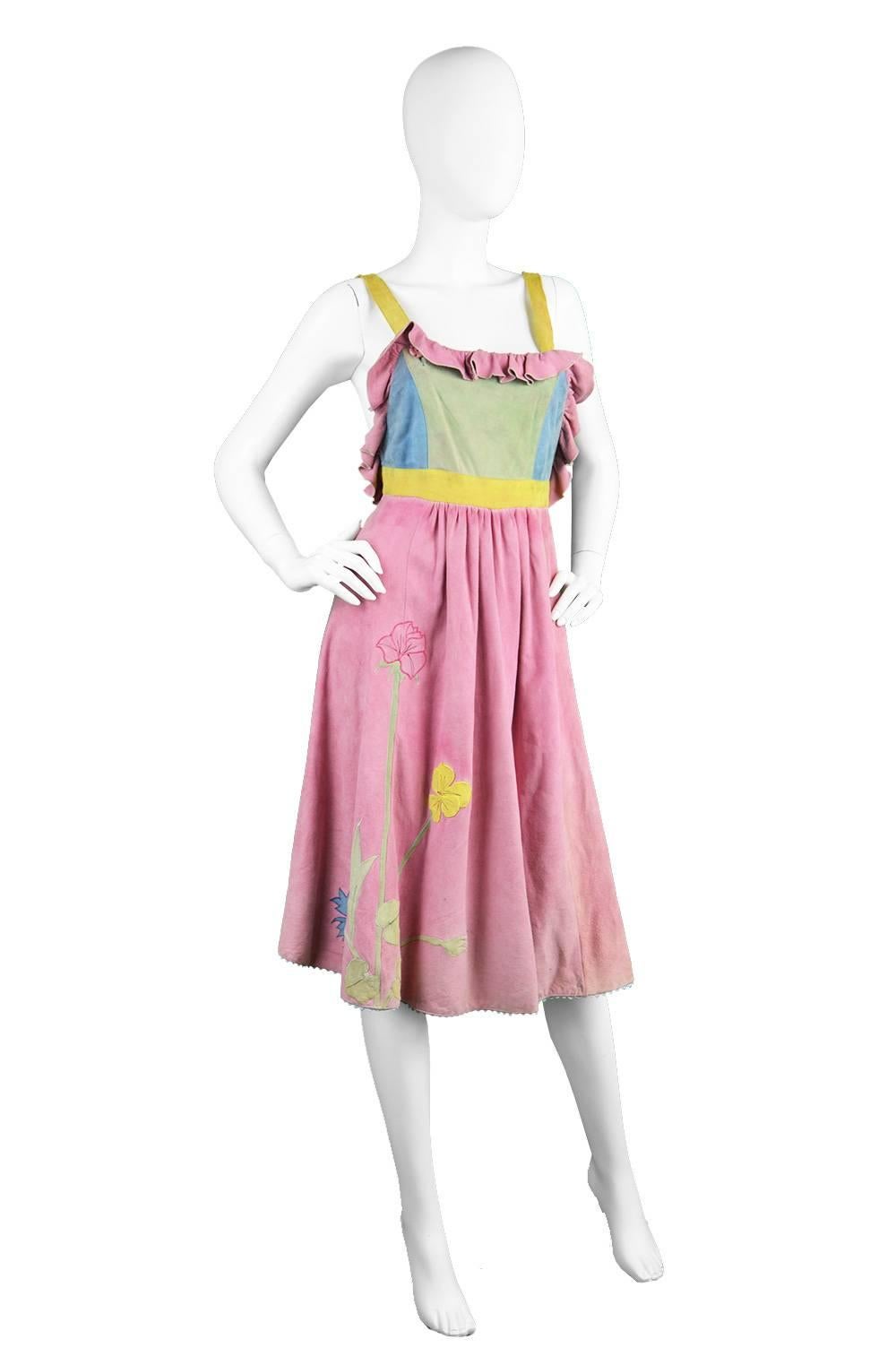 A fun and quirky vintage colorblock suede dress from the 70s by British boutique label, Pat Mariner for Edith Grove. 

Estimated Size: UK 10/ US 6/ EU 38
Bust - Open due to pinafore style
Waist - 28” / 71cm 
Hips - Free
Skirt Length (Waist to